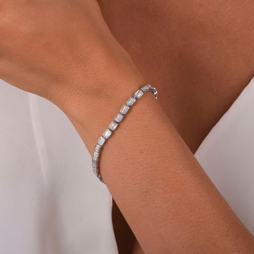 14k Gold Emerald Cut Tennis Bracelet: Bezel Set, 9 CT Diamond