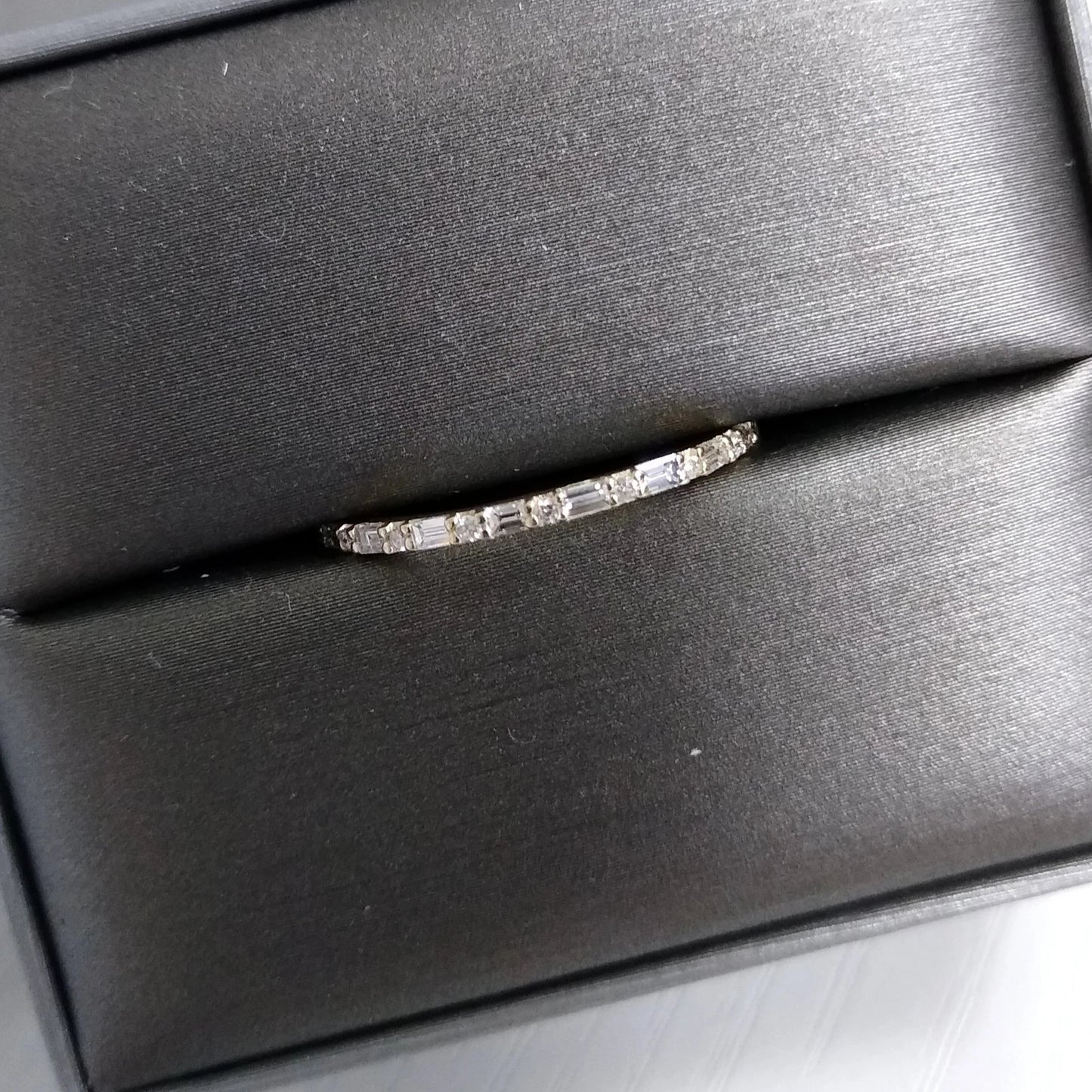 Round and Baguette Diamond Ring