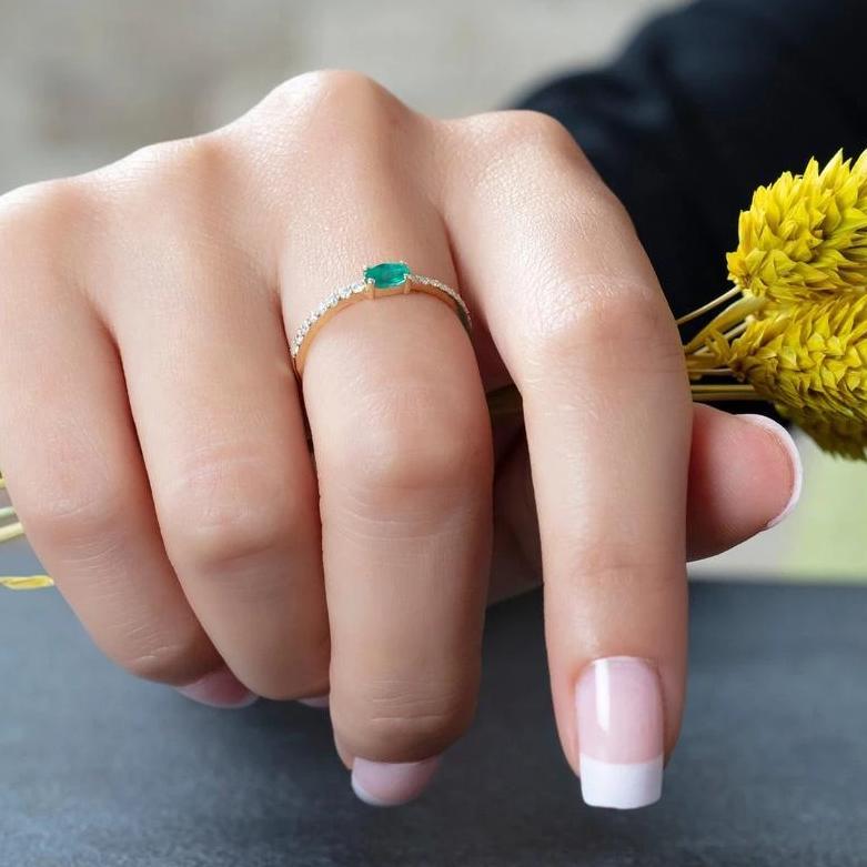 Oval Diamond Emerald Diamond Ring