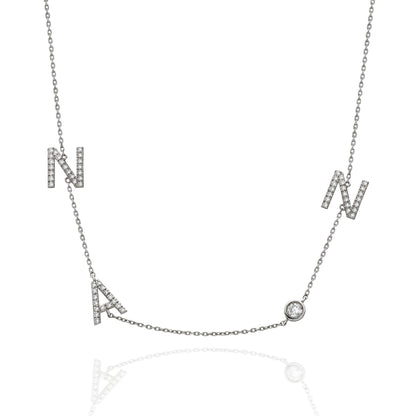 Diamond Initial Necklace and Solitaire Bezel Diamond